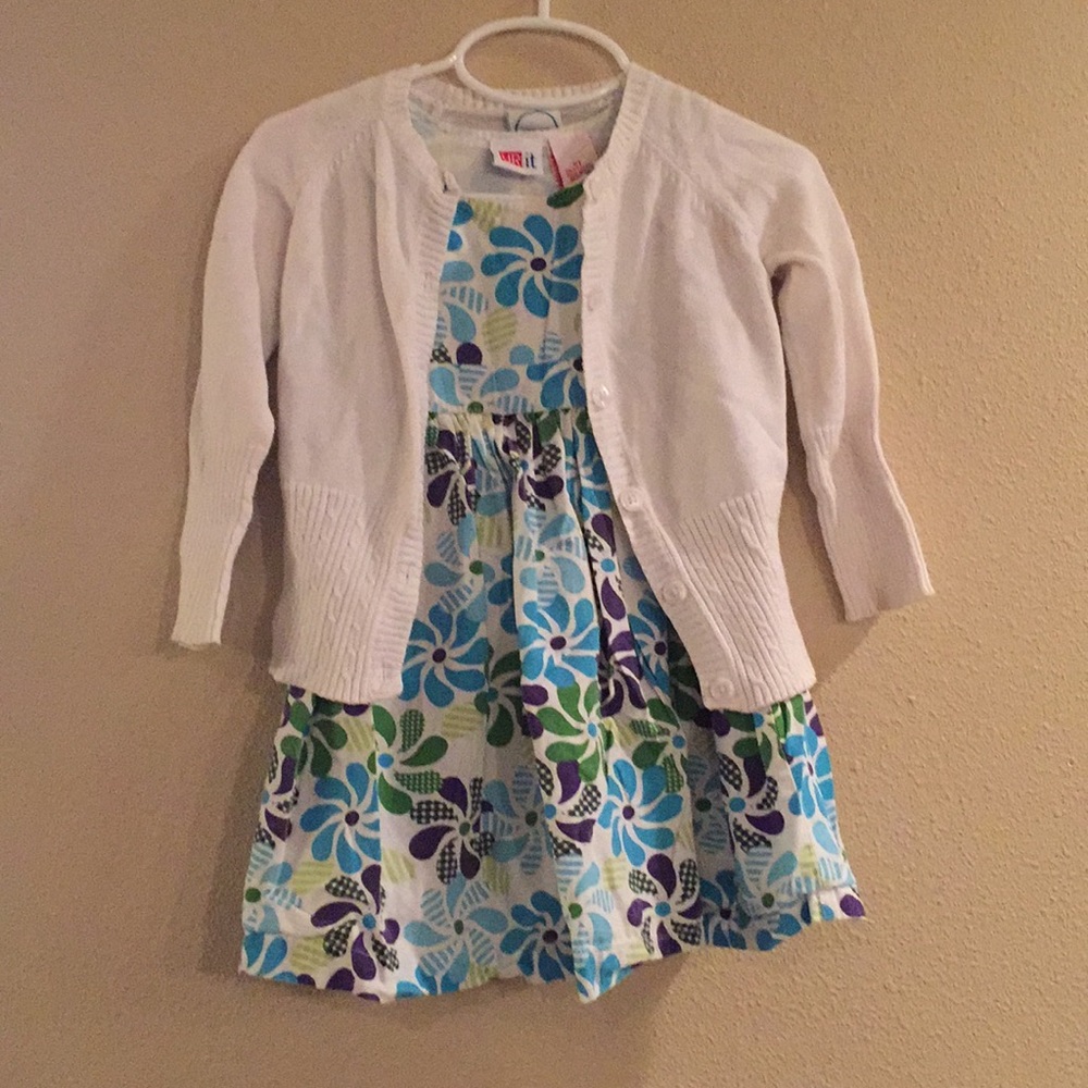 Blue dress paired with white cardigan